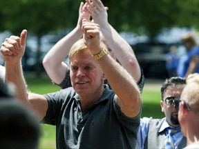Former Louisiana State Representative David Duke arrives to give remarks after a white nationalist protest was declared an unlawful assembly, Saturday, Aug. 12, 2017, in Charlottesville, Va. The nationalists were holding the rally to protest plans by the city of Charlottesville to remove a statue of Confederate Gen. Robert E. Lee. (Shaban Athuman/Richmond Times-Dispatch via AP)