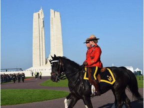 Two RCMP officers at the Vimy Memorial. Capt. Sandy McDonald took six local cadets  to Vimy for the 100 anniversary of the Battle of Vimy Ridge during World War I.  Handout/Cornwall Standard-Freeholder/Postmedia Network ORG XMIT: RkrefpDQL77qPYsir-5m