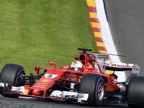 Ferrari driver Sebastian Vettel of Germany steers his car during the first practice session ahead of the Belgian Formula One Grand Prix in Spa-Francorchamps, Belgium, Friday, Aug. 25, 2017. (AP Photo/Geert Vanden Wijngaert)