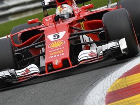 Ferrari driver Sebastian Vettel of Germany steers his car during the second practice session ahead of the Belgian Formula One Grand Prix in Spa-Francorchamps, Belgium, Friday, Aug. 25, 2017. (AP Photo/Geert Vanden Wijngaert)