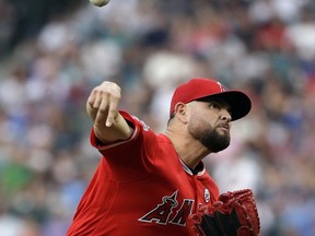 Los Angeles Angels starting pitcher Ricky Nolasco throws against the Seattle Mariners in the first inning of a baseball game Friday, Aug. 11, 2017, in Seattle. (AP Photo/Elaine Thompson)