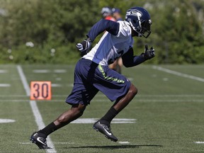 Seattle Seahawks strong safety Kam Chancellor runs during an NFL football training camp, Monday, July 31, 2017, in Renton, Wash. (AP Photo/Ted S. Warren)