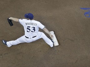 Milwaukee Brewers starting pitcher Brandon Woodruff throws during the first inning of a baseball game against the Minnesota Twins Wednesday, Aug. 9, 2017, in Milwaukee. (AP Photo/Morry Gash)