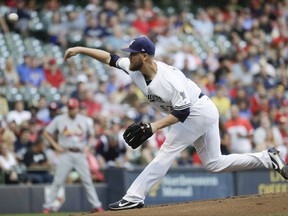 Milwaukee Brewers starting pitcher Jimmy Nelson throws during the first inning of a baseball game against the St. Louis Cardinals Tuesday, Aug. 1, 2017, in Milwaukee. (AP Photo/Morry Gash)