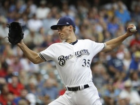 Milwaukee Brewers starting pitcher Brent Suter throws during the first inning of a baseball game against the St. Louis Cardinals Wednesday, Aug. 2, 2017, in Milwaukee. (AP Photo/Morry Gash)