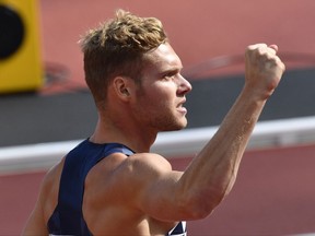 France's Kevin Mayer celebrates after setting a new personal best in the 100m event of the decathlon during the World Athletics Championships in London Friday, Aug. 11, 2017. (AP Photo/Martin Meissner)