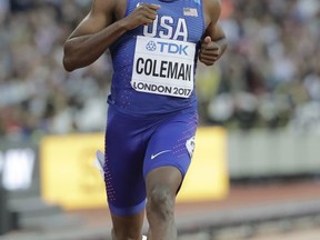 United States' Christian Coleman crosses the line to win a Men's 100m first round heat during the World Athletics Championships in London Friday, Aug. 4, 2017. (AP Photo/David J. Phillip)