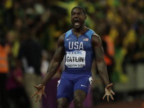 United States' Justin Gatlin celebrates after crossing the line to win the gold medal in the Men's 100m final during the World Athletics Championships in London, Saturday, Aug. 5, 2017. (AP Photo/Tim Ireland)