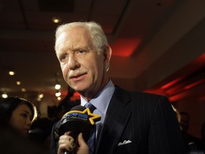 FILE - In this Jan. 5, 2010 file photo, Chesley Sullenberger responds to questions during a news interview as he arrives for the screening of a documentary entitled "Brace for Impact," in New York. Who are you going to trust when it comes to what's best for the flying public? Members of Congress or the hero of the Miracle on the Hudson, retired Capt. Chesley "Sully" Sullenberger? (AP Photo/Frank Franklin II, File)