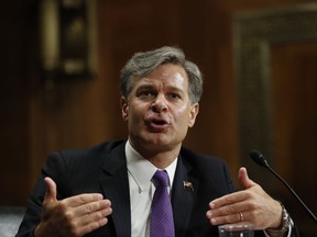 FILE - In this July 12, 2017 file photo, FBI Director nominee Christopher Wray testifies on Capitol Hill in Washington at his confirmation hearing before the Senate Judiciary Committee. The Senate is slated to vote Tuesday, Aug. 1, 2017, evening on the nomination of Wray. The former Justice Department official won unanimous support from the Judiciary Committee last month, with Republicans and Democrats praising his promise never to let politics get in the way of the bureau's mission. (AP Photo/Pablo Martinez Monsivais, File)