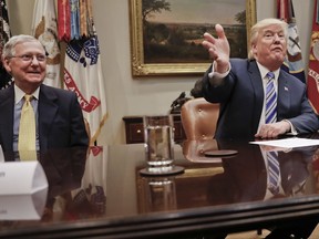 FILE - In this June 6, 2017 file photo, Senate Majority Leader Mitch McConnell of Ky. listens as President Donald Trump, speaks in the Roosevelt Room of the White House in Washington. The rift between President Donald Trump and Senate Majority Leader Mitch McConnell is poised to have lasting consequences on the GOP legislative agenda and Republicans' re-election prospects.   (AP Photo/Pablo Martinez Monsivais, File)