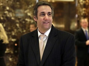 FILE - In this Dec. 16, 2016 file photo, Michael Cohen, an attorney for Donald Trump, arrives in Trump Tower in New York. Cohen acknowledged Monday, Aug. 28, 2017, that the president's company considered building a Trump Tower in Moscow during the Republican primary, but that the plan was abandoned "for a variety of business reasons." He said that at one point he reached out to the spokesman for Russian President Vladimir Putin about approvals from the Russian government.  (AP Photo/Richard Drew, File)