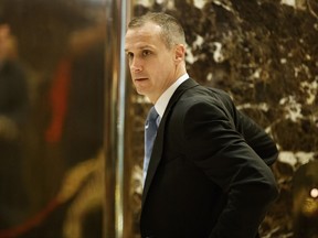 FILE - In this Nov. 29, 2016 file photo, Corey Lewandowski talks with reporters at Trump Tower in New York. Lewandowski is parlaying his close relationship with President Donald Trump into business opportunities. The president's onetime campaign manager is taking on private clients and helping Trump-friendly politicians, even as he continues to visit the White House and travel with Trump. (AP Photo/Evan Vucci, File)