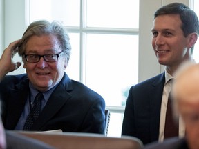 FILE - In this June 12, 2017 file photo, White House Senior Advisers Steve Bannon, left, and Adviser Jared Kushner attend a Cabinet meeting with President Donald Trump in the Cabinet Room of the White House in Washington. According to a source, Bannon is leaving White House post. (AP Photo/Andrew Harnik, File)