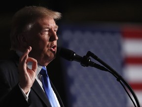 FILE - In this Aug. 21, 2017 file photo, President Donald Trump gestures during a Presidential Address to the Nation about a strategy he believes will best position the U.S. to eventually declare victory in Afghanistan, Fort Myer in Arlington Va. Behind the detail-scarce rhetoric of the new Afghanistan strategy, elements of President Donald Trump's broader approach to foreign conflicts emerge: secret military plans, no "nation-building" and a reliance on regional players to squeeze wayward nations and extremist groups. (AP Photo/Carolyn Kaster, File)