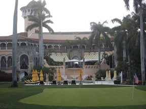 FILE - In this April 15, 2017 file photo, President Donald Trump's Mar-a-Lago estate in Palm Beach, Fla. As President Donald Trump spends much of August at his New Jersey golf club, Democratic lawmakers are making a new push for information about how much money the federal government is spending at his for-profit properties. Democrats on the House Oversight Committee are asking that departments hand over information about their Trump-related spending by Aug. 25. (AP Photo/Alex Brandon, File)