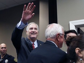 FILE - In this Aug. 4, 2017, file photo, Alabama Republican Sen. Luther Strange waves to constituents before a Republican Senate candidate forum in Pelham, Ala. President Donald Trump's feud with Senate Majority Leader Mitch McConnell hasn't yet become an all-out political proxy war. A super PAC aligned with Trump intends to help Strange's bid for re-election _ even though Strange is the candidate favored by McConnell. (AP Photo/Brynn Anderson, File)