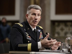 FILE - In this Feb. 9, 2017 file photo, Gen. John Nicholson, the top U.S. commander in Afghanistan, testifies on Capitol Hill in Washington. Frustrated by his options, President Donald Trump is withholding approval of a long-delayed Afghanistan war strategy and even mulling a radical shakeup in his national security team as he searches for a "game changer" after 16 years of indecisive conflict. In a recent Situation Room meeting that turned explosive, Trump raised the idea of firing Nicholson, according to two officials with knowledge of the discussion.  (AP Photo/J. Scott Applewhite, File)