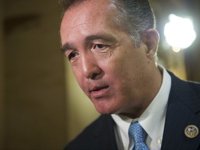 FILE - In this March 24, 2017, file photo, Rep. Trent Franks, R-Ariz. speaks with a reporter on Capitol Hill in Washington. Franks is calling on special counsel Robert Mueller to resign, citing what he says is a conflict of interest because of Mueller's "close friendship" with fired FBI Director James Comey. (AP Photo/Cliff Owen, File)