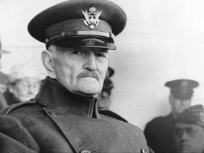 FILE - In this Nov. 11, 1942, file photo, U.S. Gen. John J. Pershing appears in uniform at Armistice Day ceremonies at Arlington Cemetery in Arlington, Va. President Donald Trump is being criticized for lauding the alleged tactics of Gen. John Pershing in dealing with Islamic extremists in the Philippines. (AP Photo)