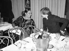 FILE - In this March 1, 1977 file photo, dancer Carmen de Lavallade chats with Rudolf Nureyev after the opening night of "Nureyev at the Uris" at a party at Sardi's in New York. The John F. Kennedy Center for the Performing Arts on Thursday announced the recipients of the 2017 Kennedy Center Honors. They are: hip-hop artist LL Cool J, singers Gloria Estefan and Lionel Richie, television writer and producer Norman Lear and dancer Carmen de Lavallade. It's the 40th year of the awards, which honor people who have influenced American culture through the arts. (AP Photo/Carlos Rene Perez)