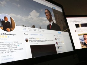 In this Wednesday, Aug. 30, 2017, photo, a Twitter page of Chinese exiles businessman Guo Wengui is seen on a computer screen in Beijing. Escalating efforts to repatriate one of its most wanted exiles, China's ruling Communist Party has opened a police investigation on a new allegation, rape, against New York-based billionaire Guo, who has been releasing what he calls official secrets ahead of a pivotal party leadership conference. (AP Photo/Andy Wong)