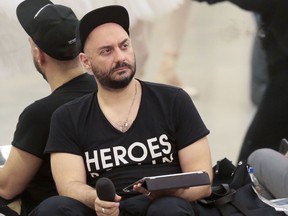 In this photo taken on Tuesday, June 27, 2017, Kirill Serebrennikov, one of Russia's most venerated theater and film directors leads a rehearsal in the Bolshoi Theater, in Moscow, Russia.  In a statement Tuesday Aug. 22, 2017, Russia's top investigative body says it has detained Serebrennikov and is pressing charges against him of embezzling 68 million rubles (US dlrs 1.1 million) of government funds that were earmarked for a production at his theater. (AP Photo/Damir Yusupov)