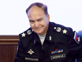 FILE - In this file photo taken on Friday, Oct. 7, 2016, Russian Deputy Defense Minister Anatoly Antonov smiles at a briefing in the Defense Ministry in Moscow, Russia. Antonov, who has gained the reputation of a hawk during his earlier tenure at the Defense Ministry, was named the new Russian ambassador to the United States on Friday. (AP Photo/Ivan Sekretarev, File)