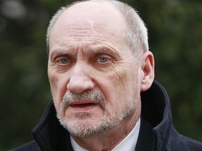 FILE - This file photo from March 14, 2016, shows Poland's Defense Minister Antoni Macierewicz in Warsaw, Poland. The OSCE, a 57-member security organization, says it is concerned about legal steps the Polish government is taking against a reporter who alleges Macierewicz has longstanding ties with Russian military agents and members of the Russian mafia. (AP Photo/Czarek Sokolowski, file)