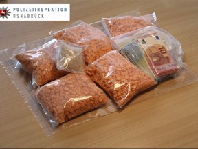 In this undated picture provided  by the Osnabrueck , Germany, police department,  ecstacy pills are on display. German police say they have seized thousands of ecstasy pills in the shape of President Donald Trump's head, a haul with an estimated street value of 39,000 euros ($45,900). Police in Osnabrueck, in northwestern Germany, say they found the drugs during a check Saturday Aug. 19, 2017  on an Austrian-registered car on the A30 highway. (Osnabrueck police via AP)