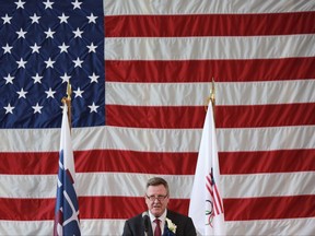 U.S. Olympic Committee CEO Scott Blackmun speaks at Tokyo American Club in Tokyo Wednesday, Aug. 2, 2017. The U.S. Olympic team will be based at the Tokyo American Club during the 2020 Tokyo Olympics, USOC officials announced on Wednesday. (AP Photo/Eugene Hoshiko)