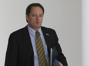 Lee McClenny, center, Chargé d'Affaires of the U.S. Embassy in Caracas arrives for a meeting with Venezuela's Foreign Ministry Jorge Arreaza in Caracas, Venezuela, Saturday, Aug. 12, 2017. President Donald Trump's talk of a "military option" in Venezuela risks alienating governments in Latin America that had overcome their reluctance to work with the immigrant-bashing Republican leader and adopt a common, hard line approach to isolating the country's socialist government. (AP Photo/Ariana Cubillos)