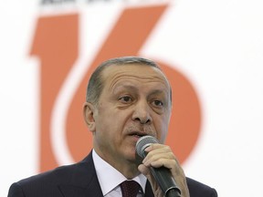 In this Monday, Aug. 14, 2017 photo, Turkey's President Recep Tayyip Erdogan, delivers a speech in Ankara, Turkey. Erdogan condemned Germany's mainstream parties on Friday, Aug. 18, 2017 and urged German-Turkish voters to not support them in the upcoming elections there. He said the rising tension between the two countries was a result of Germany's internal political conflicts and explicitly named the Christian Democrats, the Social Democrats and the Greens as "enemies of Turkey". (Pool Photo via AP)