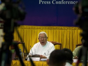 Zaw Myint Pe, secretary of Maungdaw Investigation Commission, talks to journalists during a press conference of their final report on Rakhine state investigation at a government guest house Sunday, Aug. 6, 2017, in Yangon, Myanmar. The Myanmar government's inquiry into violence in northern Rakhine state last year that forced tens of thousands of Muslim Rohingya to flee to Bangladesh and led to U.N. accusations of crimes against humanity by the army has concluded that no such crimes happened. (AP Photo/Thein Zaw)