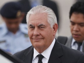 U.S. Secretary of State Rex Tillerson arrives at a military base in Subang, Malaysia, Tuesday, Aug. 8, 2017. (AP Photo/Vincent Thian)