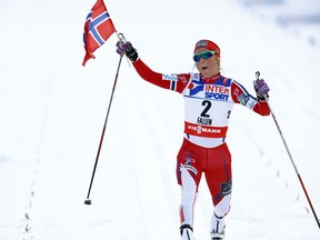 In this Feb. 28, 2015 file photo, Norway's Therese Johaug crosses the finish line to win the women's 30 km mass start event at the Nordic Skiing World Championships in Falun, Sweden.