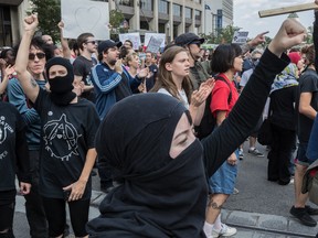 The far-right group La Meute and counter-protesters, organized by a group called Citizen Action Against Discrimination as well as the Ligue anti-fasciste Québec clashed in Quebec City, on Sunday, August 20, 2017. Police moved the counter-protesters through the streets declaring the demo illegal.