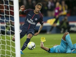 PSG's Neymar scores against Toulouse during the French League One soccer match between PSG and Toulouse at the Parc des Princes stadium in Paris, France, Sunday, Aug. 20, 2017. (AP Photo/Kamil Zihnioglu)