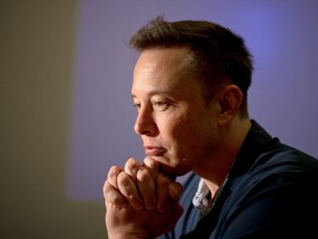 Elon Musk, co-founder and chief executive officer of Tesla Motors Inc., pauses during an interview at the company's assembly plant in Fremont, California, U.S., on Wednesday, July 10, 2013.