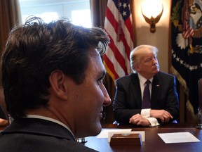 Prime Minister Justin Trudeau and U.S. President Donald Trump take part in a business roundtable discussion at the White House in Washington, D.C. on Monday, Feb. 13, 2017.