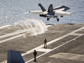 In this image taken Tuesday, May 2, 2017, and released by the U.S. Navy, an F/A-18E Super Hornet launches from the aircraft carrier USS Carl Vinson as they transit the western Pacific Ocean.