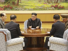 In this Sept. 3, 2017, image distributed on Monday, Sept. 4, 2017, by the North Korean government, North Korea's leader Kim Jong Un holds a meeting of the ruling party's presidium.