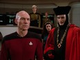 Patrick Stewart as Captain Jean-Luc Picard, (R) John de Lancie as Q, (Back right) Marina Sirtis as Counselor Deanna Troi and (back center) Denise Crosby as Lieutenant Tasha Yar in the first episode of Star Trek: The Next Generation called Encounter at Farpoint from 1987.