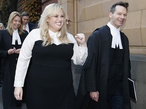 Rebel Wilson pumps her fist at the media on June 15, 2017 in Melbourne, Australia.