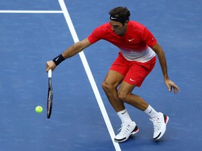 Roger Federer returns a shot against Mikhail Youzhny during their second-round match on Day 4 of the 2017 U.S. Open on Aug. 31, 2017 in New York.