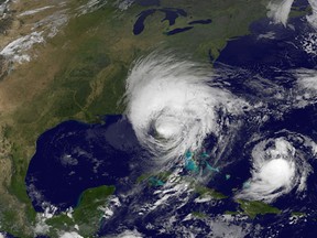 GOES satellite shows Hurricane Irma as it moves on the Florida coast as Tropical Storm Jose (R) moves west in the Atlantic Ocean taken at 05:30 UTC on September 11, 2017