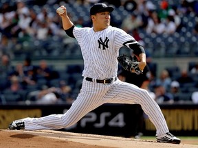 Masahiro Tanaka of the New York Yankees pitches during the first inning against the Toronto Blue Jays at Yankee Stadium on Sept. 29, 2017.