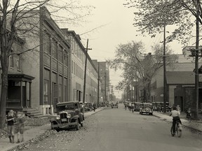 A day in the life of Ottawa in 1937, on Slater Street, looking east from Lyon.