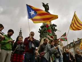 Pro independence supporters wave "estelada" or pro independence flags during a rally in support for the secession of the Catalonia region from Spain, in Vitoria, northern Spain, Saturday, Sept. 9, 2017. Spanish Prime Minister Mariano Rajoy's office says members of his cabinet are meeting Thursday to react to plans by Catalan leaders who have scheduled a vote on the region's secession from Spain. (Alvaro Barrientos)