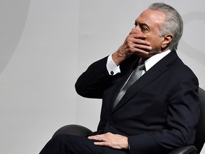 This file photo taken on August 16, 2017 shows Brazilian President Michel Temer during an Economic Forum in Sao Paulo, Brazil, on August 16, 2017.